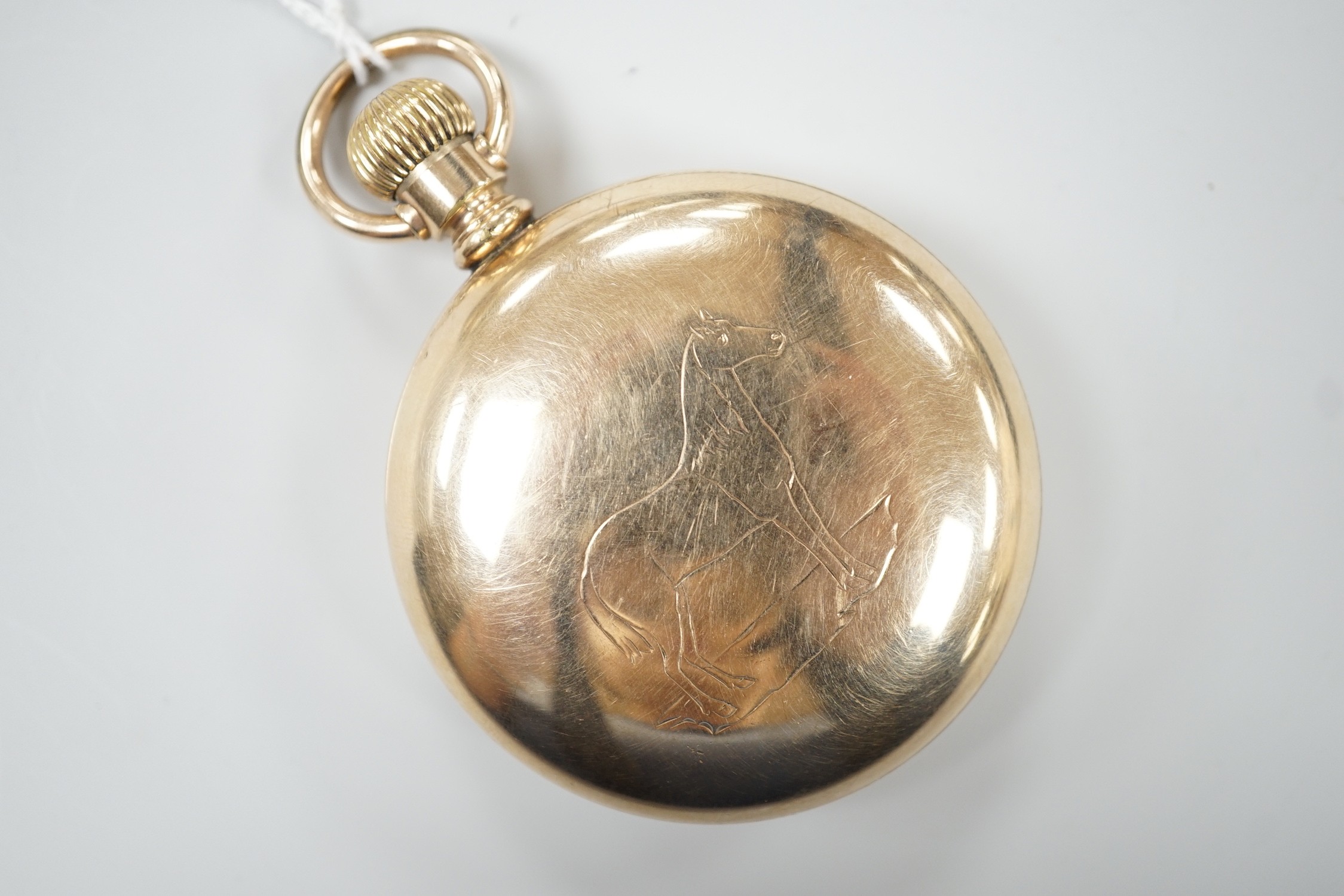 An American gold plated Rockford Watch Co. keyless open faced pocket watch, with Roman dial and subsidiary seconds, the case back engraved with a horse.